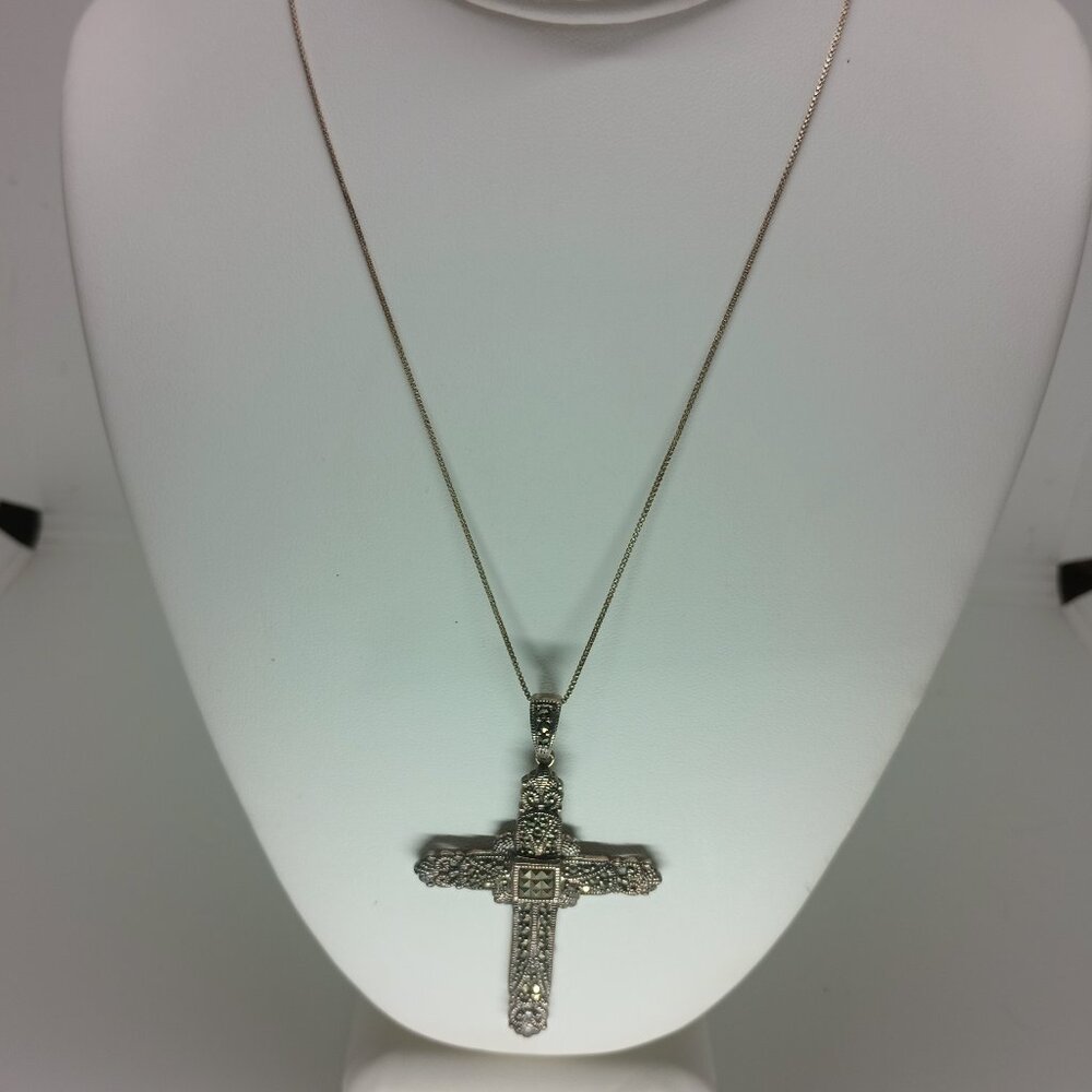925 Sterling Silver decorative cross pendant with Marcasite and silver chain.